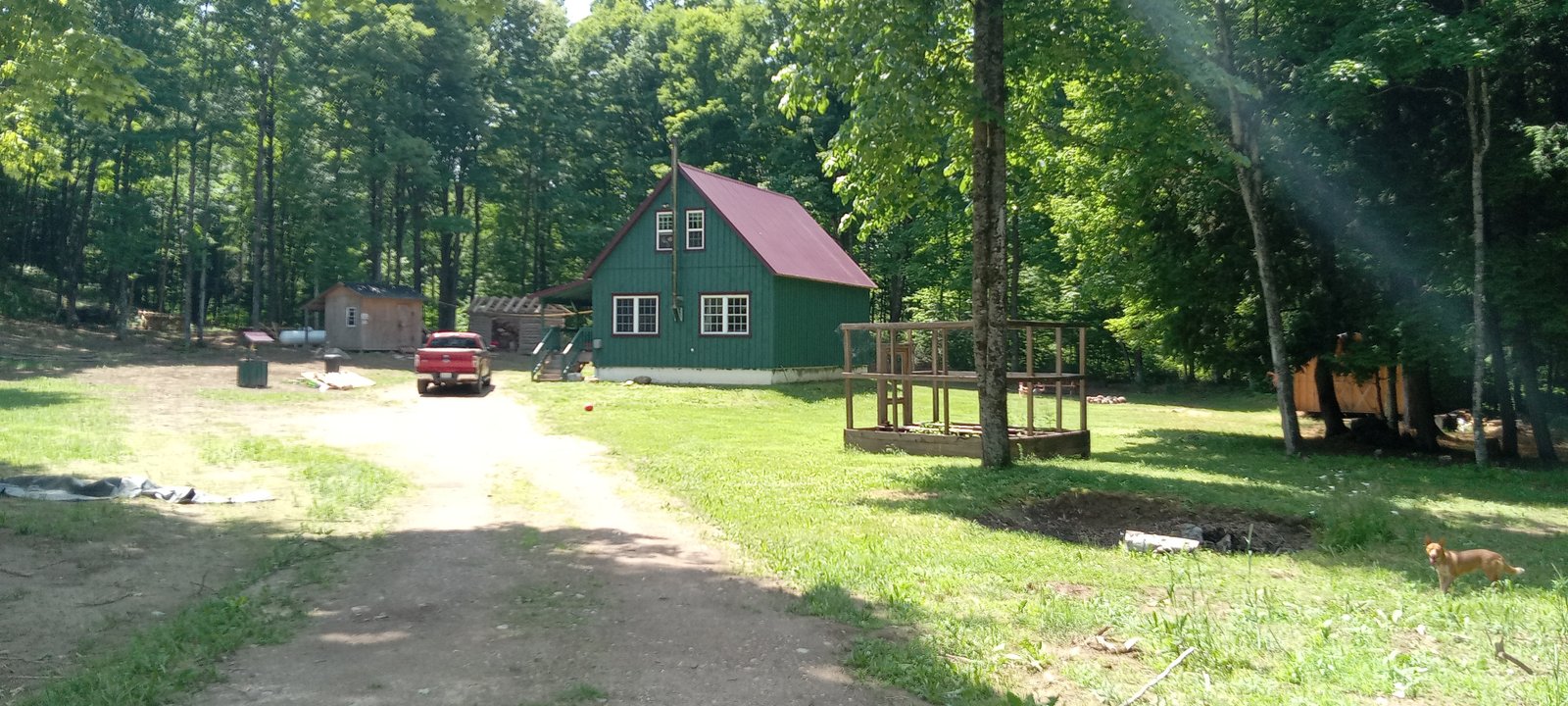 Al & Val's Homestead home they built from rough cut lumber sourced from a local Amish sawmill.  A loft style 3 bedroom, two full bath home with board and batten siding.  Built on a 24' x 32' ICF Blook foundation and pad, the home is super insulated, heated with a wood stove, but has all the modern ameneties and features you'd expect from any professionally built house.  The furniture, buthcerblock counters, kitchen cabinets, and much more was constructed by Val.